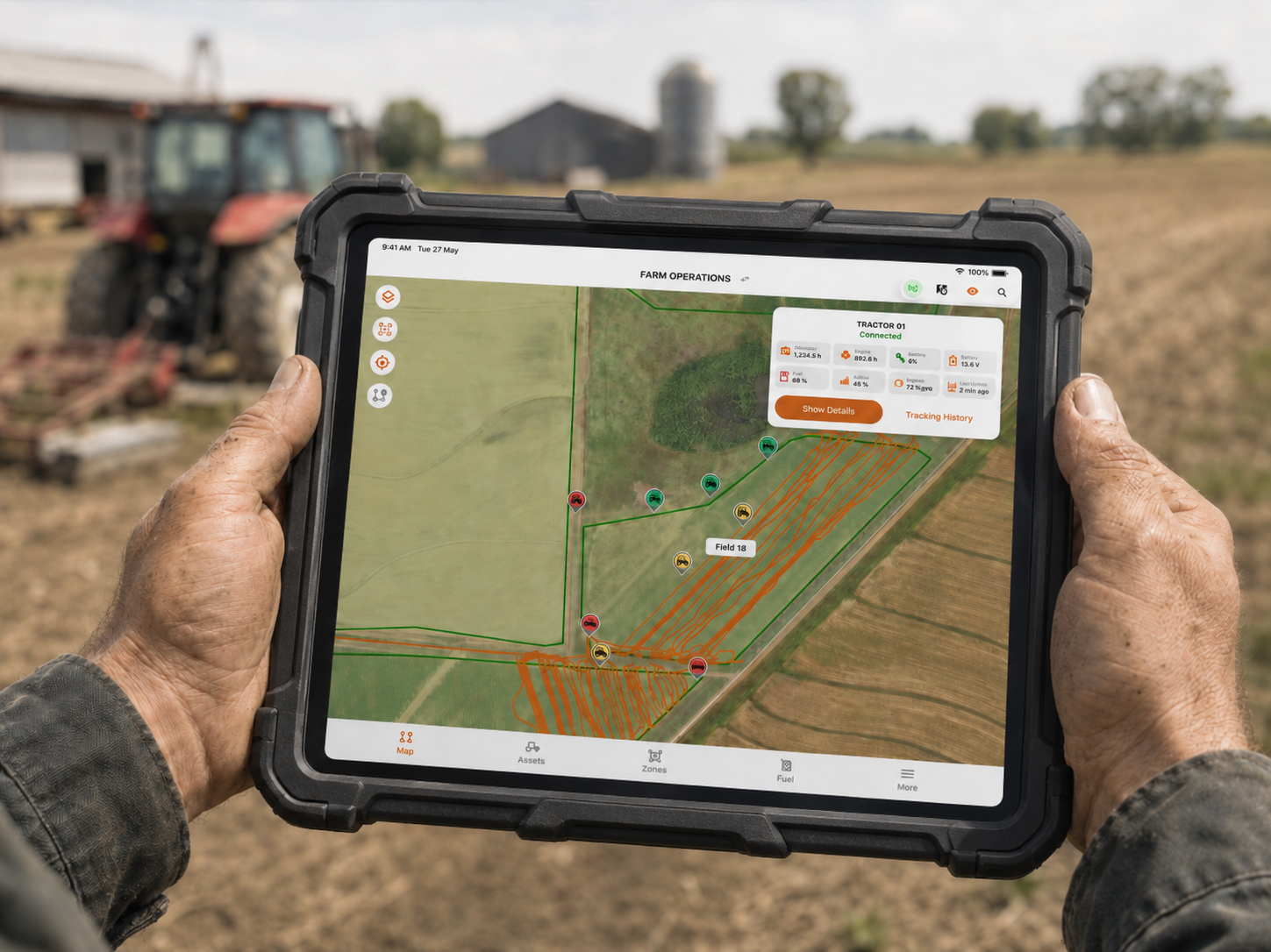 Rugged tablet showing farm vehicle tracking in a field